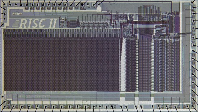 Photo of a RISC II chip, in the upper left corner is the picture of a small Porsche 911 etched onto the die.

Risc II will become the Sun Sparc line of CPUs.